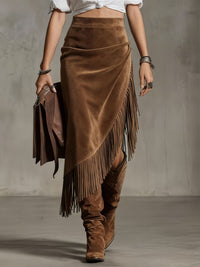 Woman wearing the western fringed suede skirt