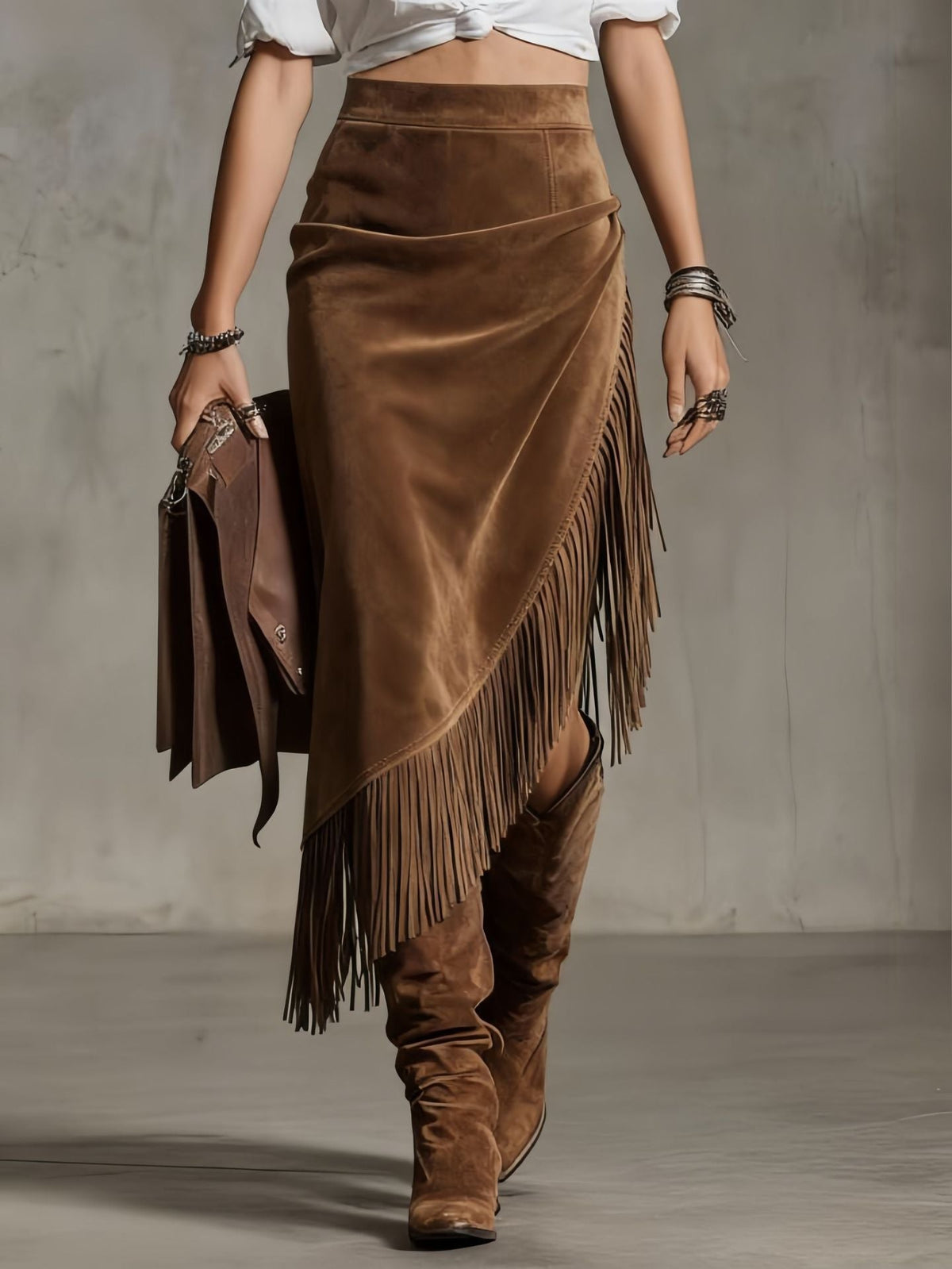 Woman wearing the western fringed suede skirt