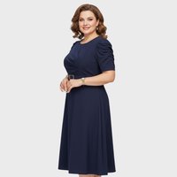 Woman wearing the harriet bloom soft-touch ruched midi dress