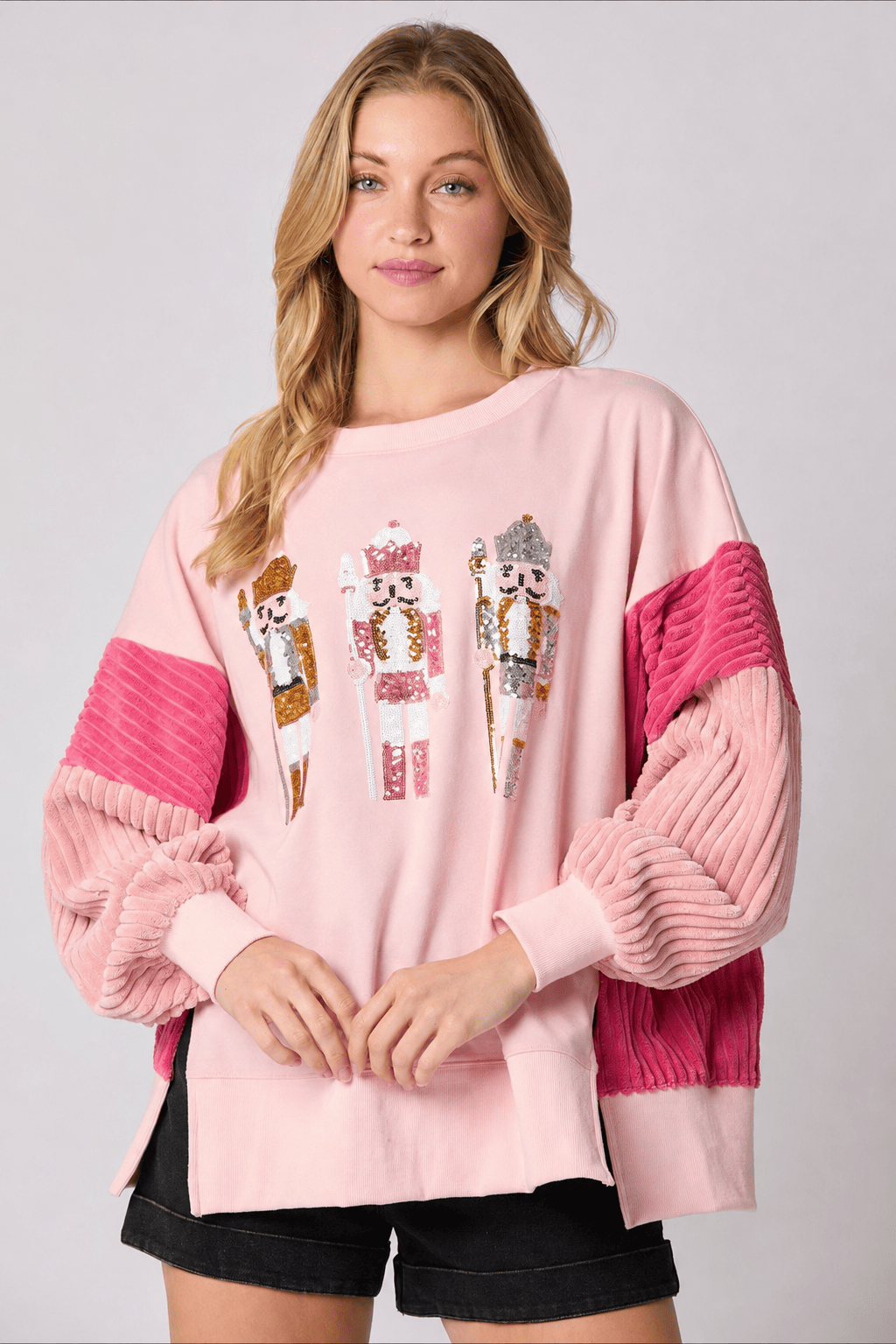 Detail of the sequin toy soldier crew neck sweatshirt