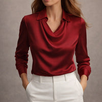 Detail of the isola draped satin blouse