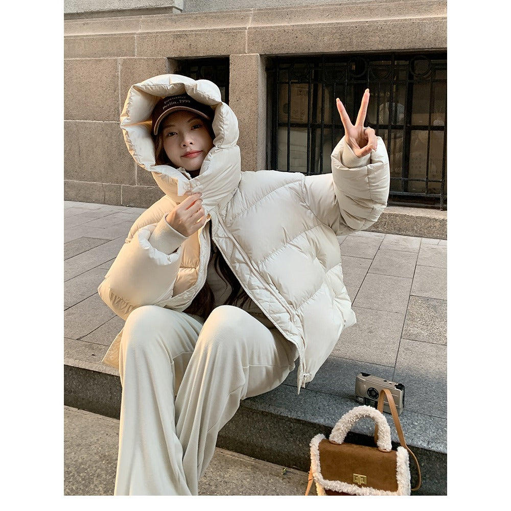 Woman wearing the rina hooded puffer jacket