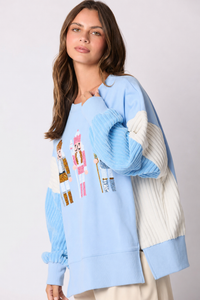 Front view of the sequin toy soldier crew neck sweatshirt