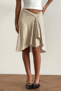 Styled look with the plaid asymmetric midi skirt