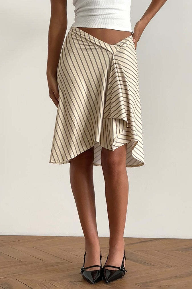 Styled look with the plaid asymmetric midi skirt