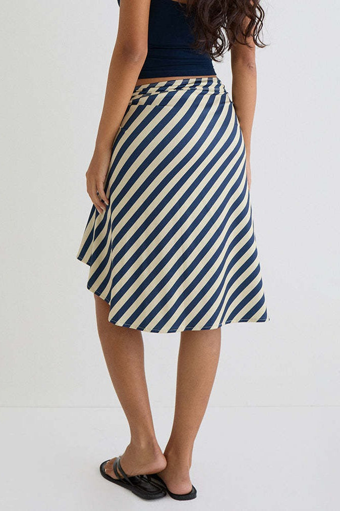 Front view of the plaid asymmetric midi skirt
