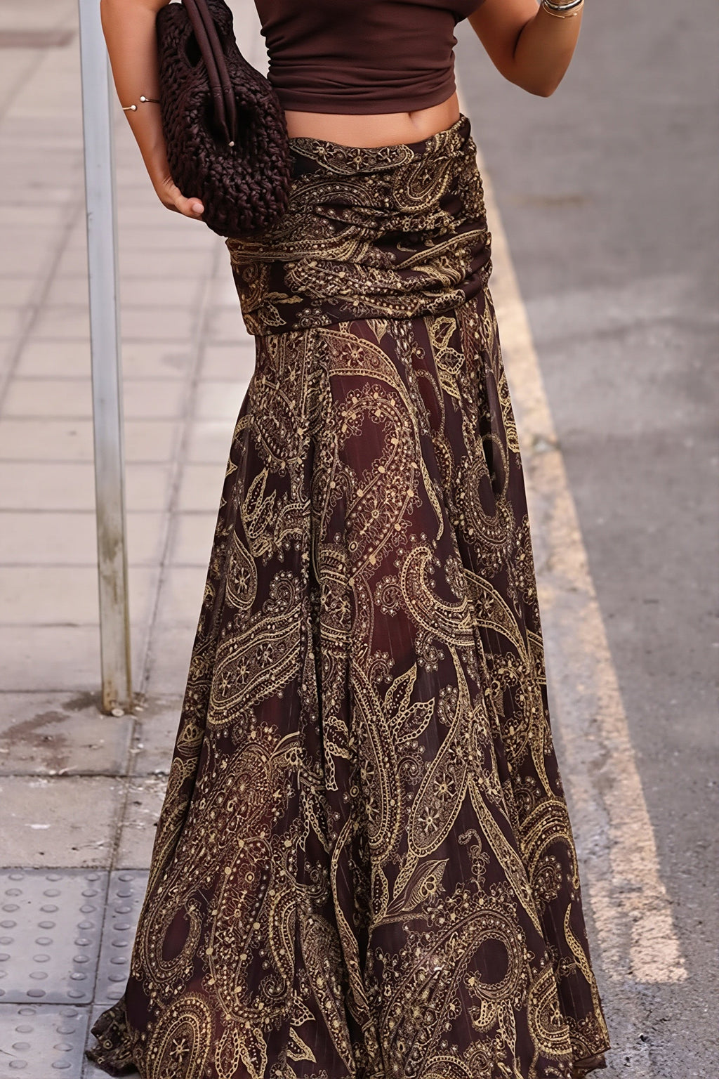 Woman wearing the boho brown paisley print maxi skirt