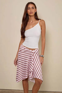 Detail of the plaid asymmetric midi skirt