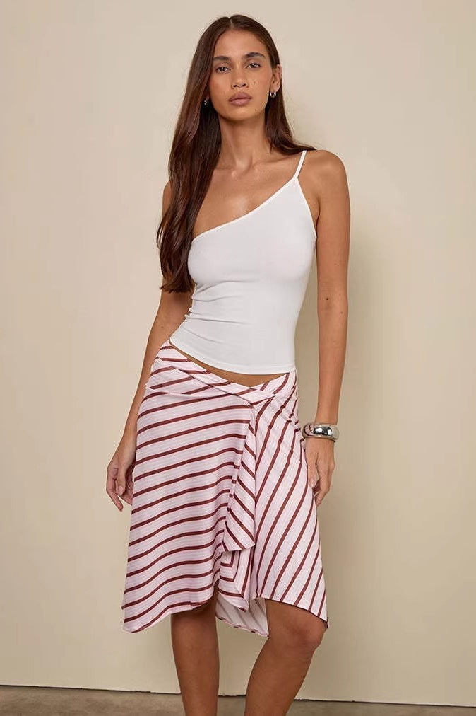 Detail of the plaid asymmetric midi skirt
