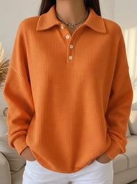 Styled look with the women's textured knit polo sweater oversized