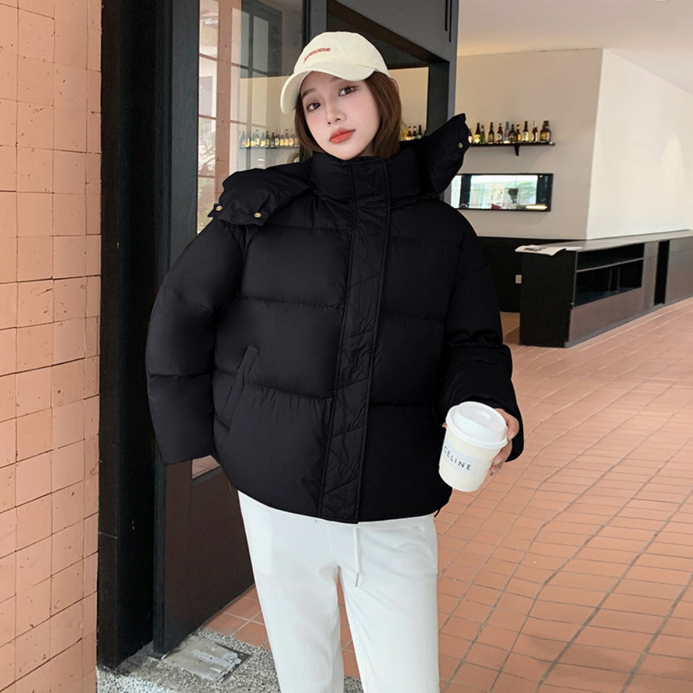 Detail of the rina hooded puffer jacket