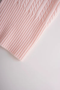 Back view of the fur trim strawberry milk cable knit cardigan (pink)