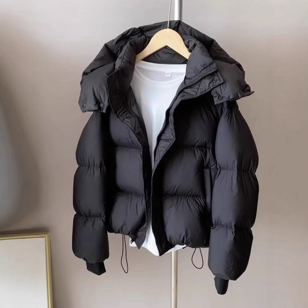 Woman wearing the rina hooded puffer jacket