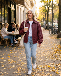 Oversized Colorblock Windbreaker Jacket in Cherry, worn with jeans and sneakers on an autumn street