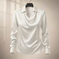 Detail of the isola draped satin blouse