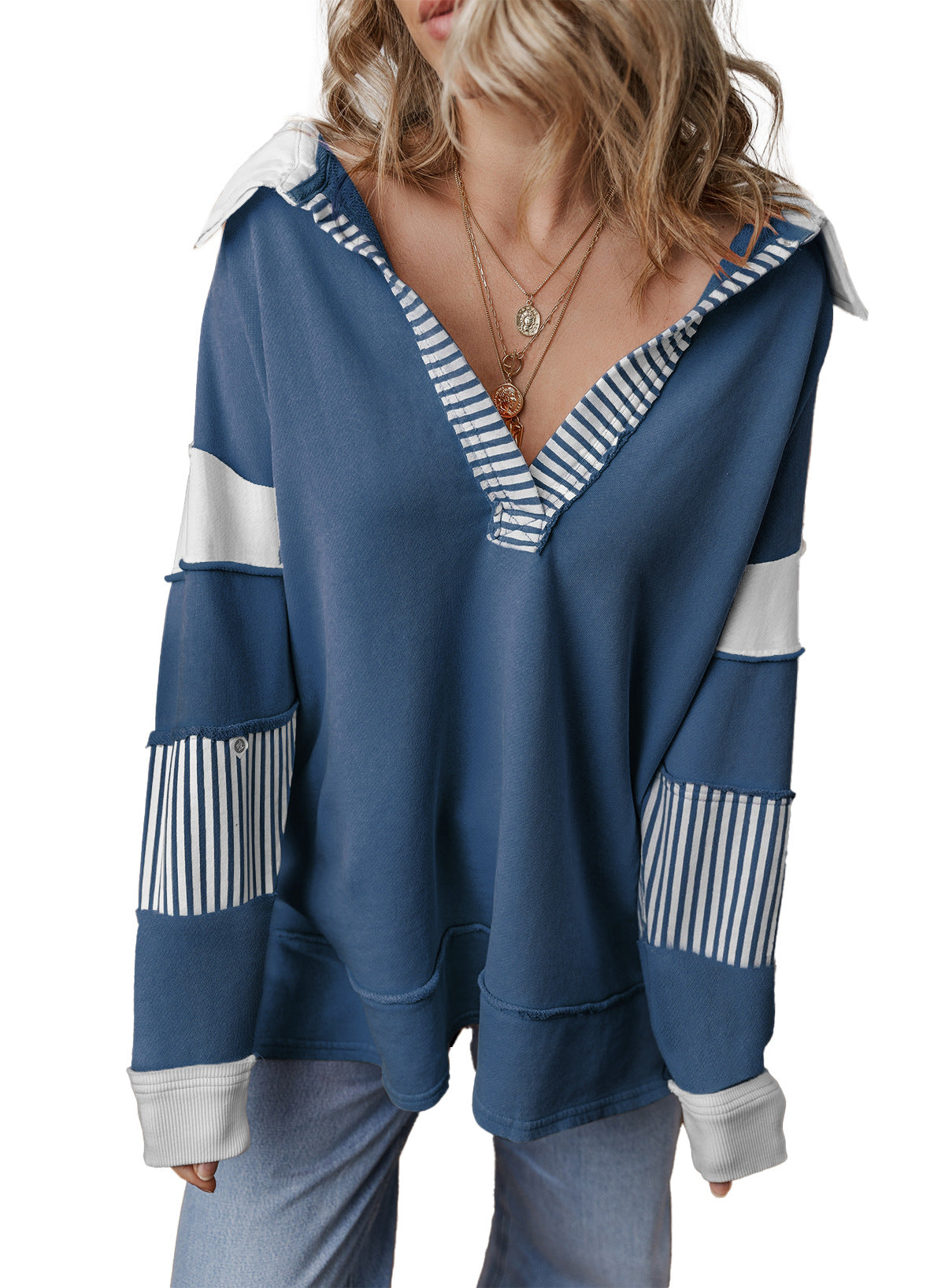 Back view of the oversized v-neck striped sweatshirt