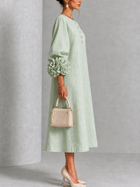 Elegant Sage Green Textured Midi Dress for Women with Round Neck Balloon Sleeve Floral Cuff Fall Wedding Guest Style - Susan & Anne