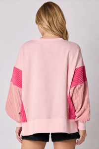 Front view of the sequin toy soldier crew neck sweatshirt