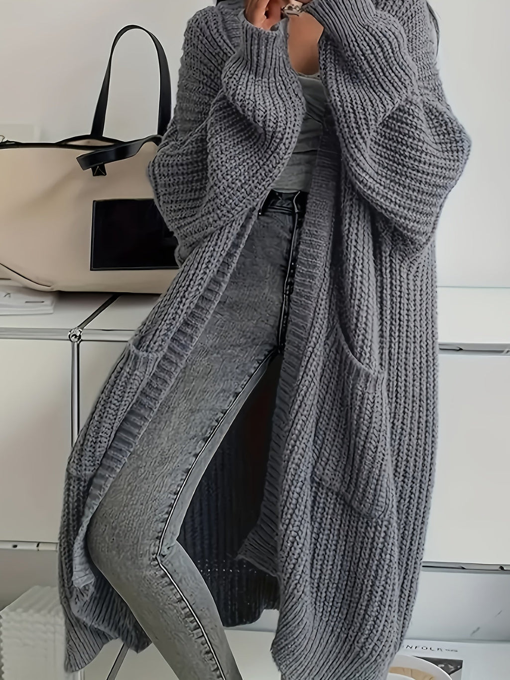 Hemline detail of the rosalienne soft-touch longline cardigan