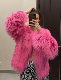 Back view of the fur elegant fringe coat