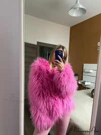 Woman wearing the fur elegant fringe coat