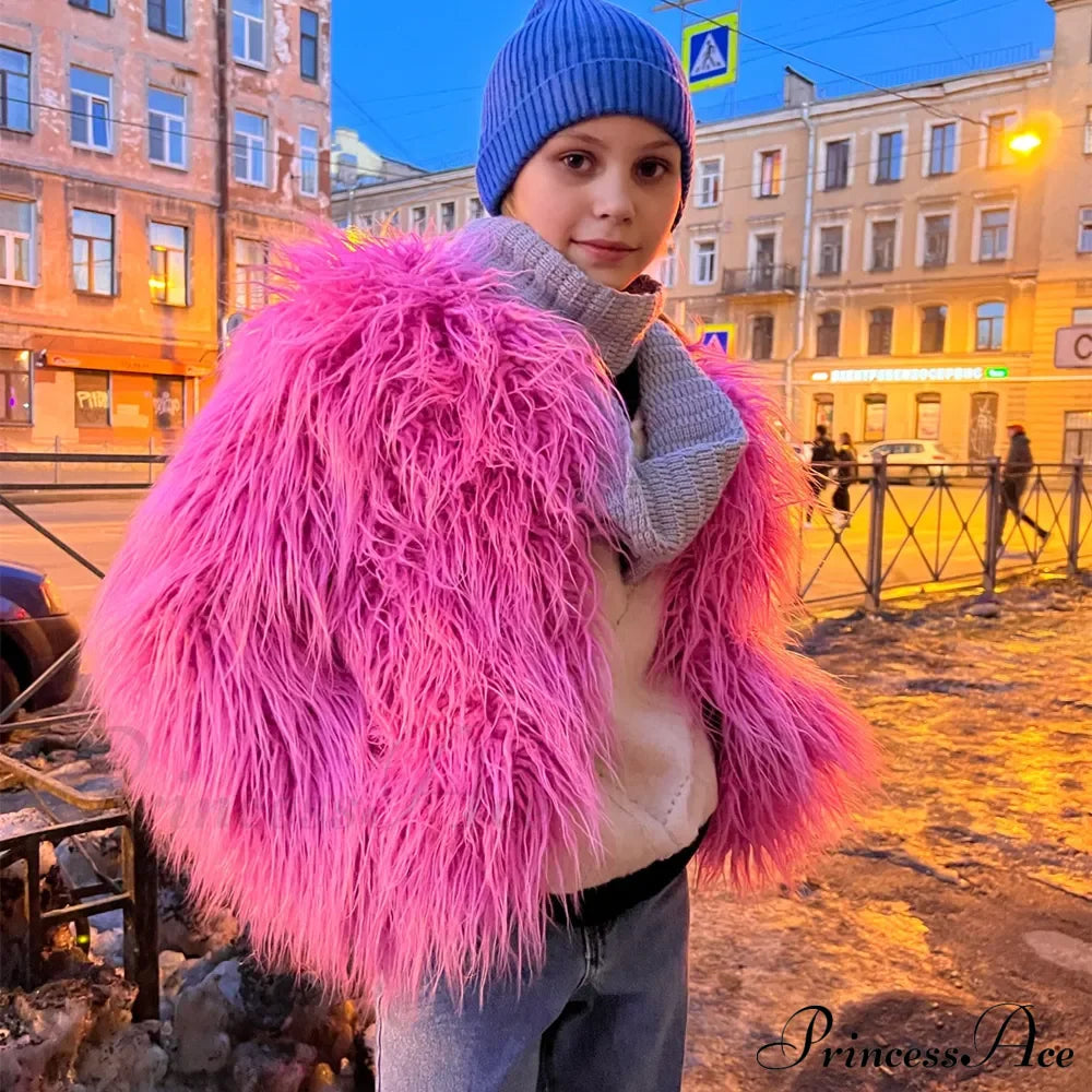 Woman wearing the fur elegant fringe coat