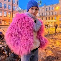 Woman wearing the fur elegant fringe coat