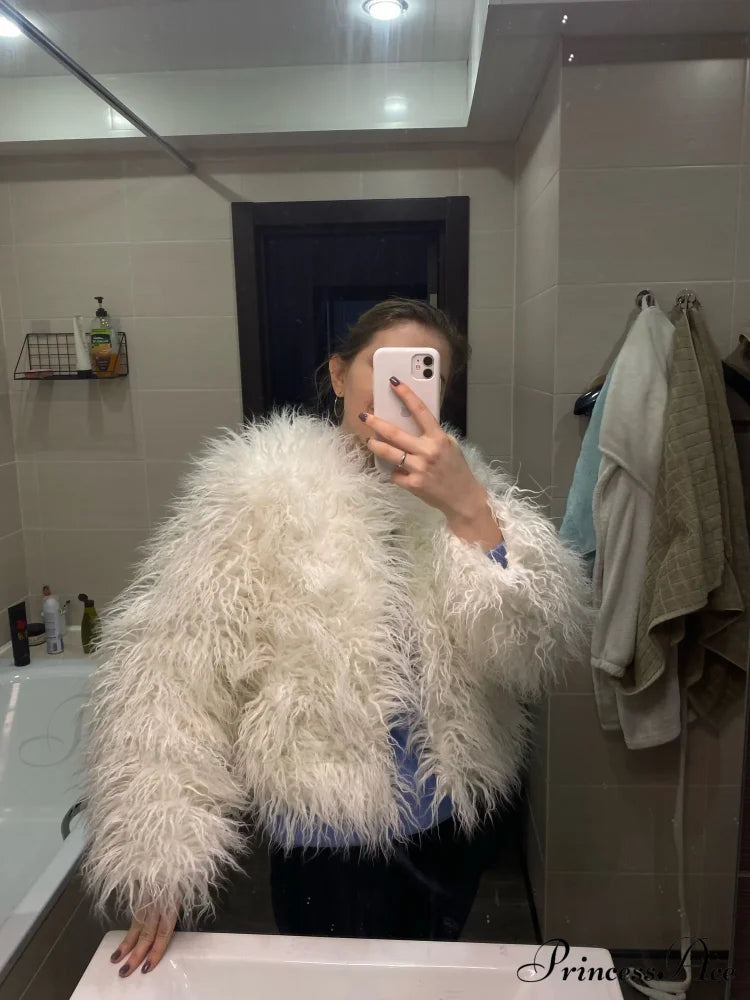 Detail of the fur elegant fringe coat