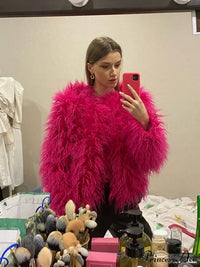 Detail of the fur elegant fringe coat