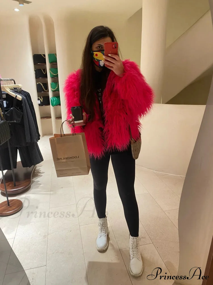 Woman wearing the fur elegant fringe coat