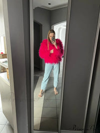 Front view of the fur elegant fringe coat