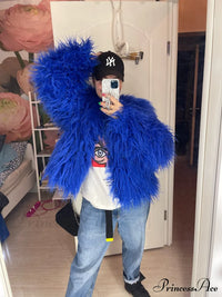 Back view of the fur elegant fringe coat