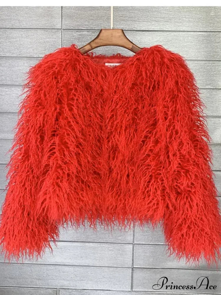 Woman wearing the fur elegant fringe coat