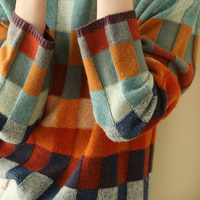 Ribbed cuffs on the patchwork check sweater