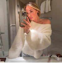 Close-up of the selene off-shoulder knit sweater