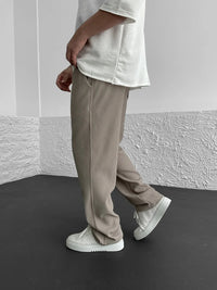 Front view of the relaxed heavyweight knit wide-leg pants | baggy stretch-waist fit