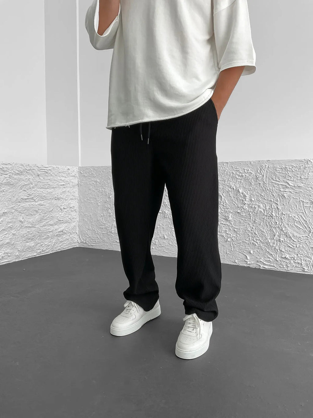 Back view of the relaxed heavyweight knit wide-leg pants | baggy stretch-waist fit