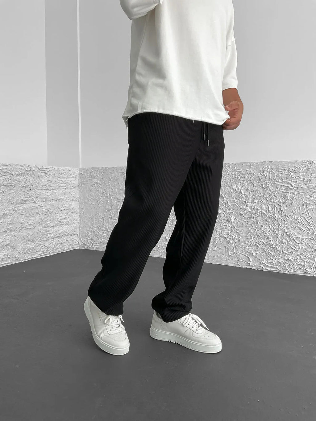 Close-up texture of the relaxed heavyweight knit wide-leg pants | baggy stretch-waist fit