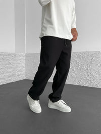 Close-up texture of the relaxed heavyweight knit wide-leg pants | baggy stretch-waist fit