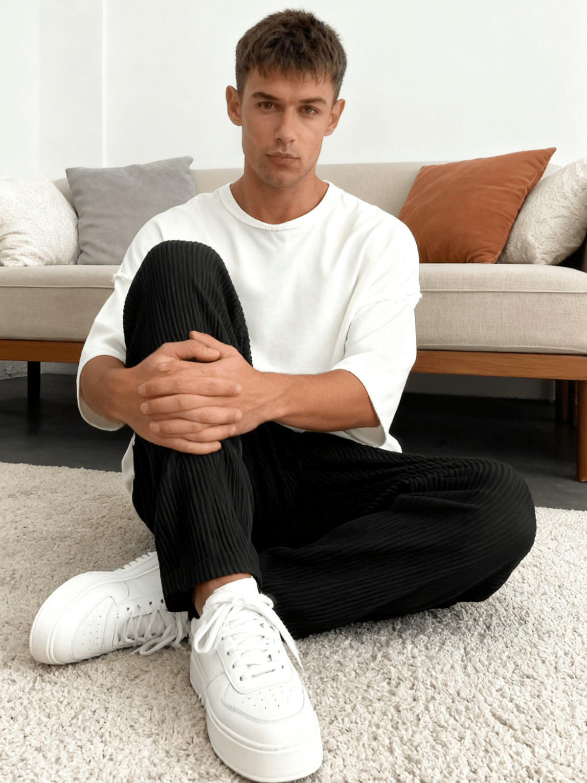 Sleeve and cuff detail on the relaxed heavyweight knit wide-leg pants | baggy stretch-waist fit