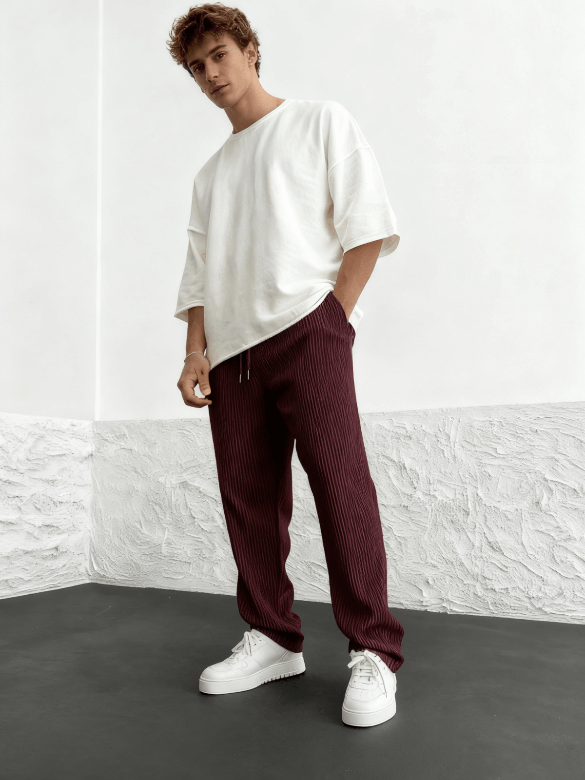 Side profile of the relaxed heavyweight knit wide-leg pants | baggy stretch-waist fit