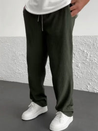 Back view of the relaxed heavyweight knit wide-leg pants | baggy stretch-waist fit