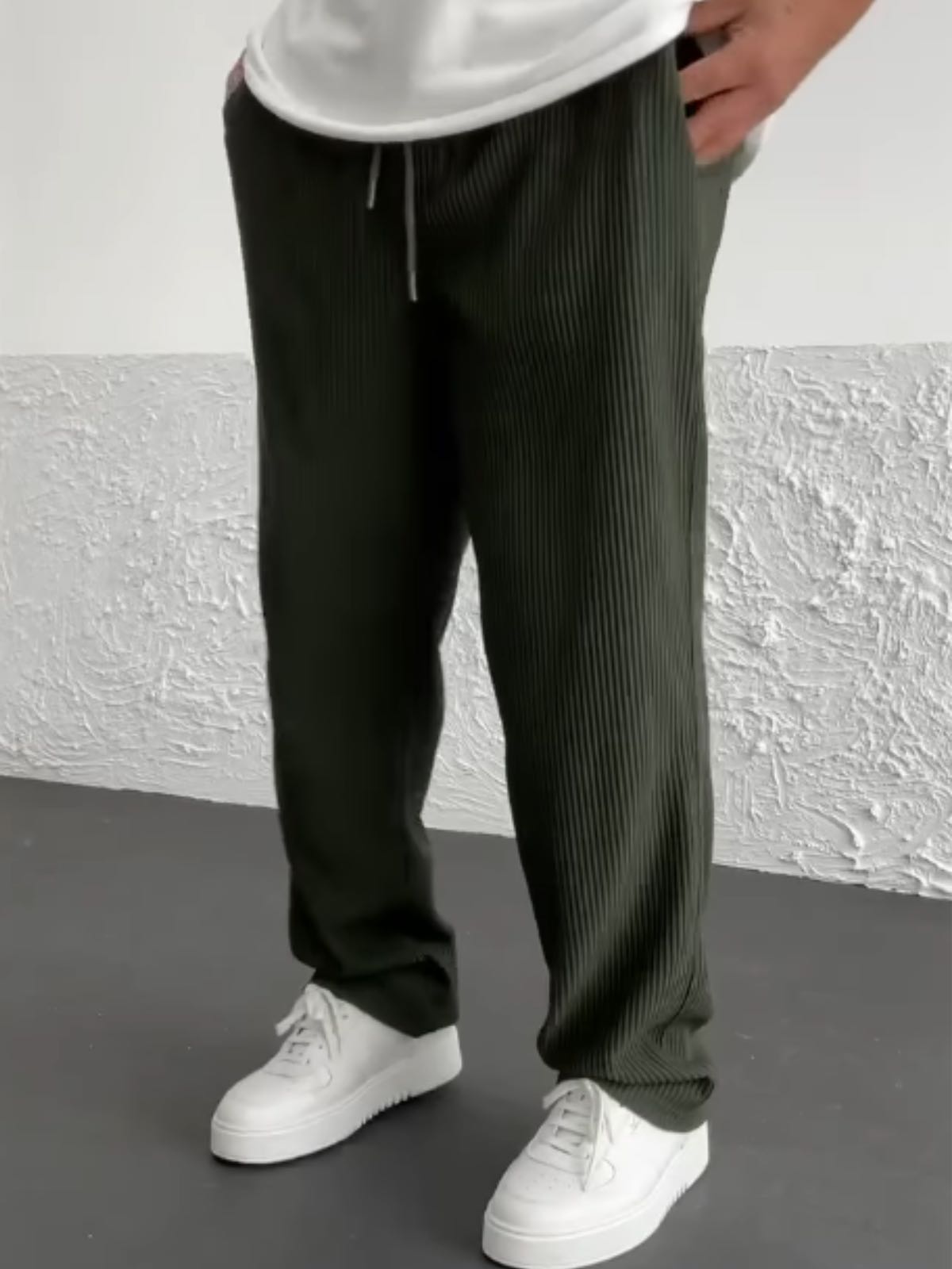 Back view of the relaxed heavyweight knit wide-leg pants | baggy stretch-waist fit
