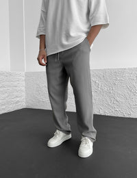 Sleeve and cuff detail on the relaxed heavyweight knit wide-leg pants | baggy stretch-waist fit