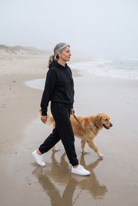 Black fleece hoodie and jogger set styled on Cape Cod for women 50+ – Susan & Anne