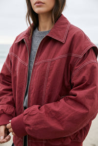 Burgundy oversized windbreaker jacket styled on Cape Cod for women 50+ – Susan & Anne