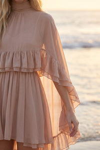 Blush chiffon cape dress styled on Cape Cod for women 50+ – Susan & Anne