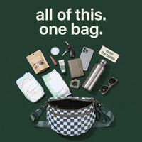 Everything that fits in The Freehand crossbody bag: diaper, wipes, water bottle, phone, wallet, keys
