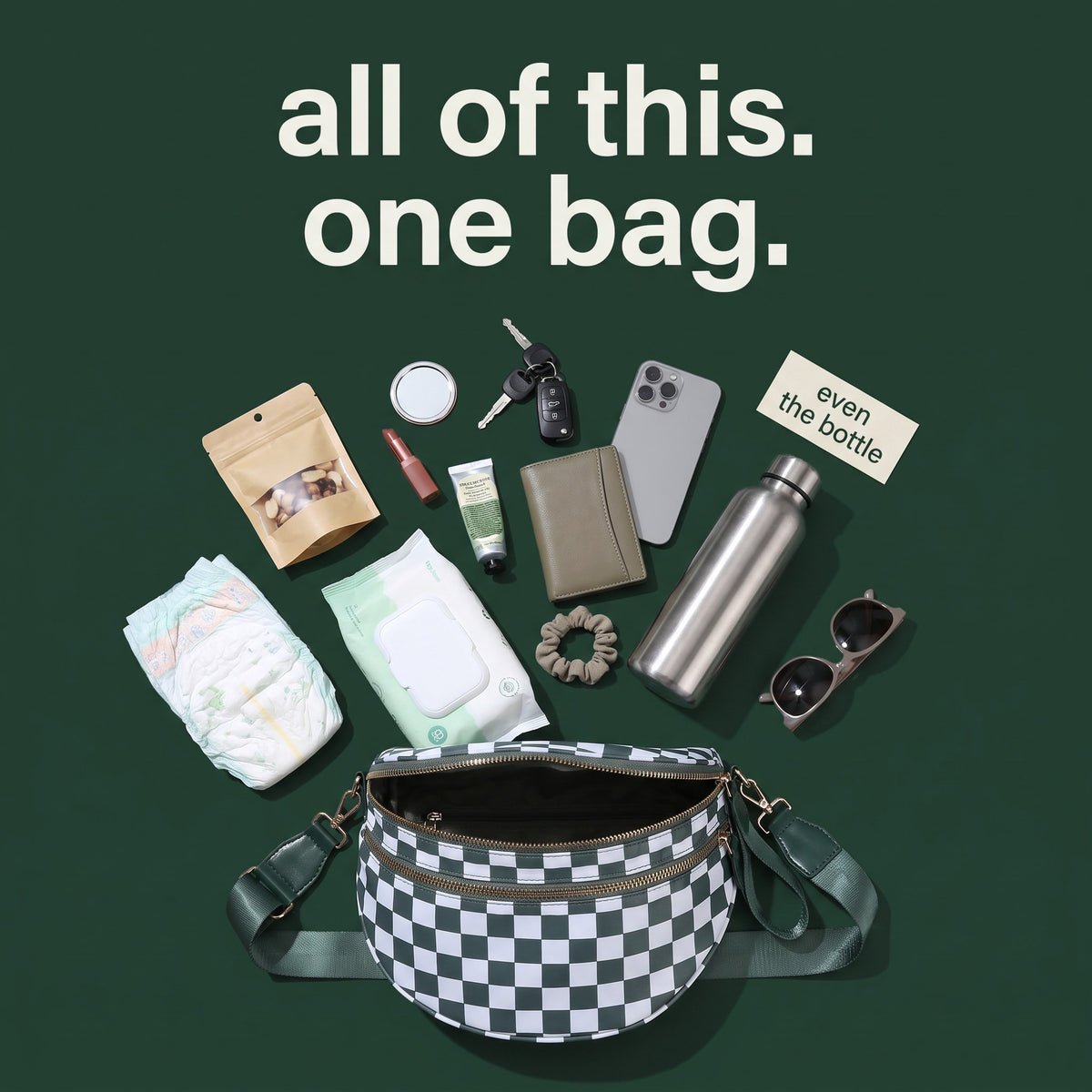 Everything that fits in The Freehand crossbody bag: diaper, wipes, water bottle, phone, wallet, keys
