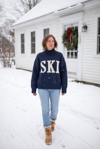 Navy SKI chunky knit sweater styled on Cape Cod for women 50+ – Susan & Anne